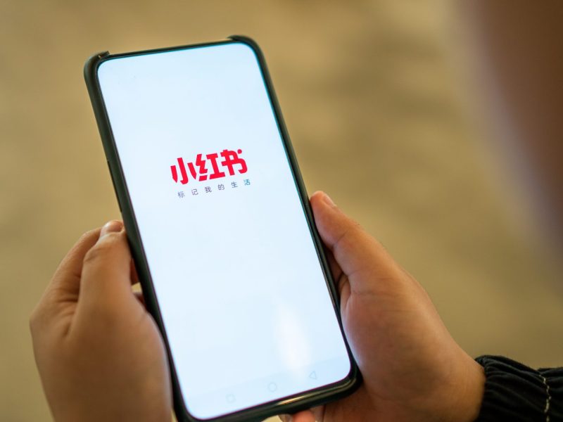 A user opens the Xiaohongshu app. (Image credit: TechNode/Eugene Tang)